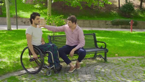 Disabled-young-man-chatting.-Slow-Motion.